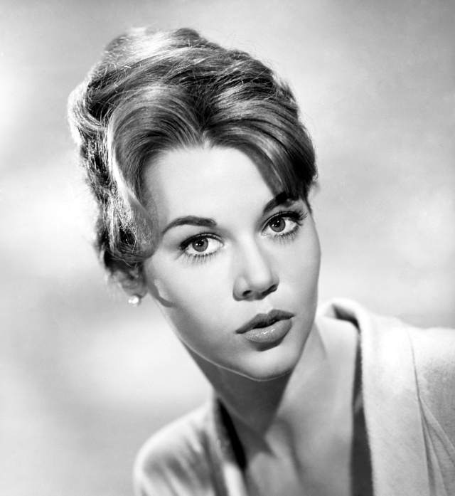 1960: Studio headshot portrait of American actor Jane Fonda, with her hair tied back in a bun.